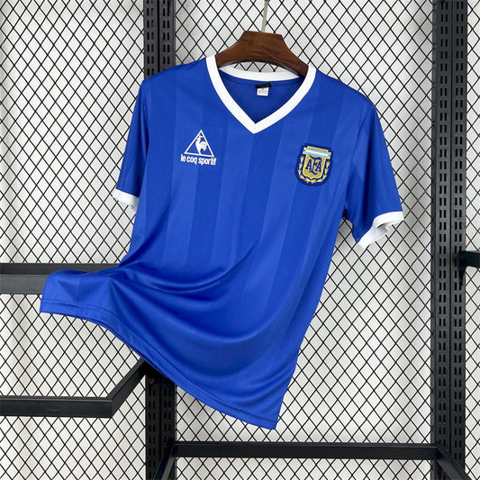 CAMISETA ARGENTINA 1986 RETRO VISITA HOMBRE (VERSIÓN FAN)