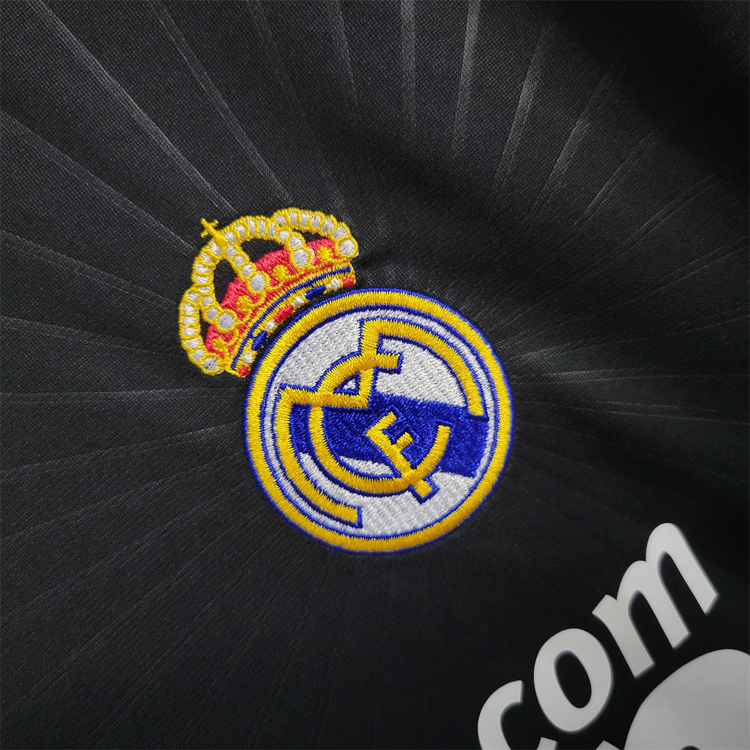 CAMISETA REAL MADRID 2010/11 RETRO VISITA HOMBRE MANGA LARGA (VERSIÓN FAN)